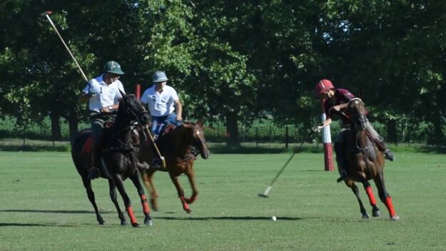 playpolodays Players playing polo over horse at El Venado
